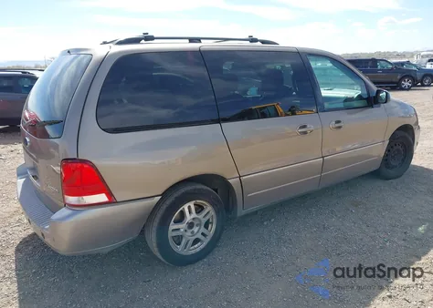 2004 Ford Freestar Limited из США, поврежденный, VIN 2FMDA58244BB22717